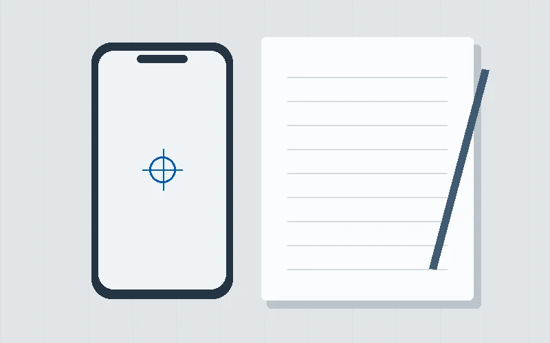 Telefon und Notizbuch zur Kontaktaufnahme